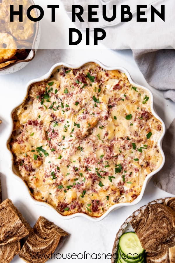 Hot reuben dip in a baking dish with text overlay.