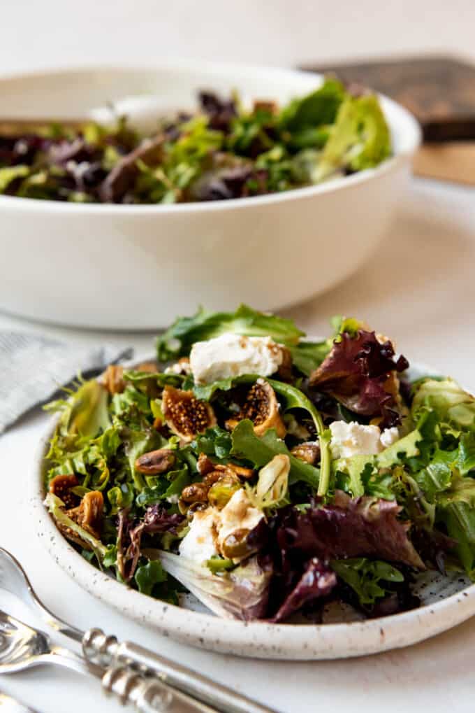 A plate of mixed greens salad.