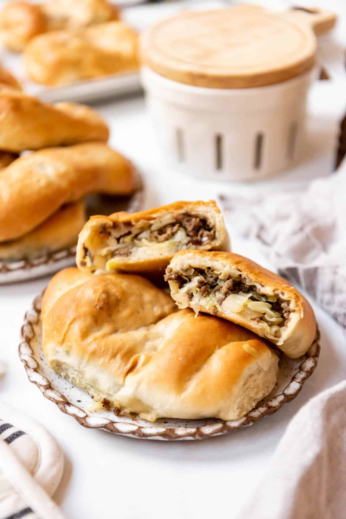 A plate of homemade runzas with beef and cabbage filling.