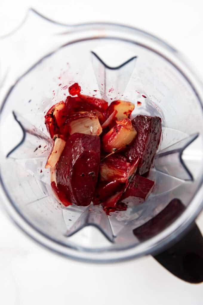 Roasted beets, onions, and garlic in a blender.