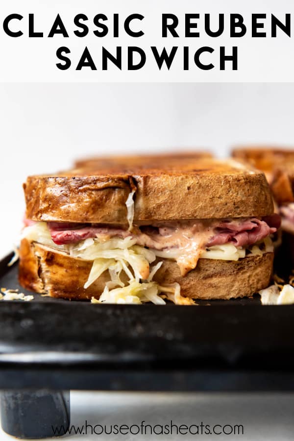 A Reuben sandwich on a griddle with text overlay.