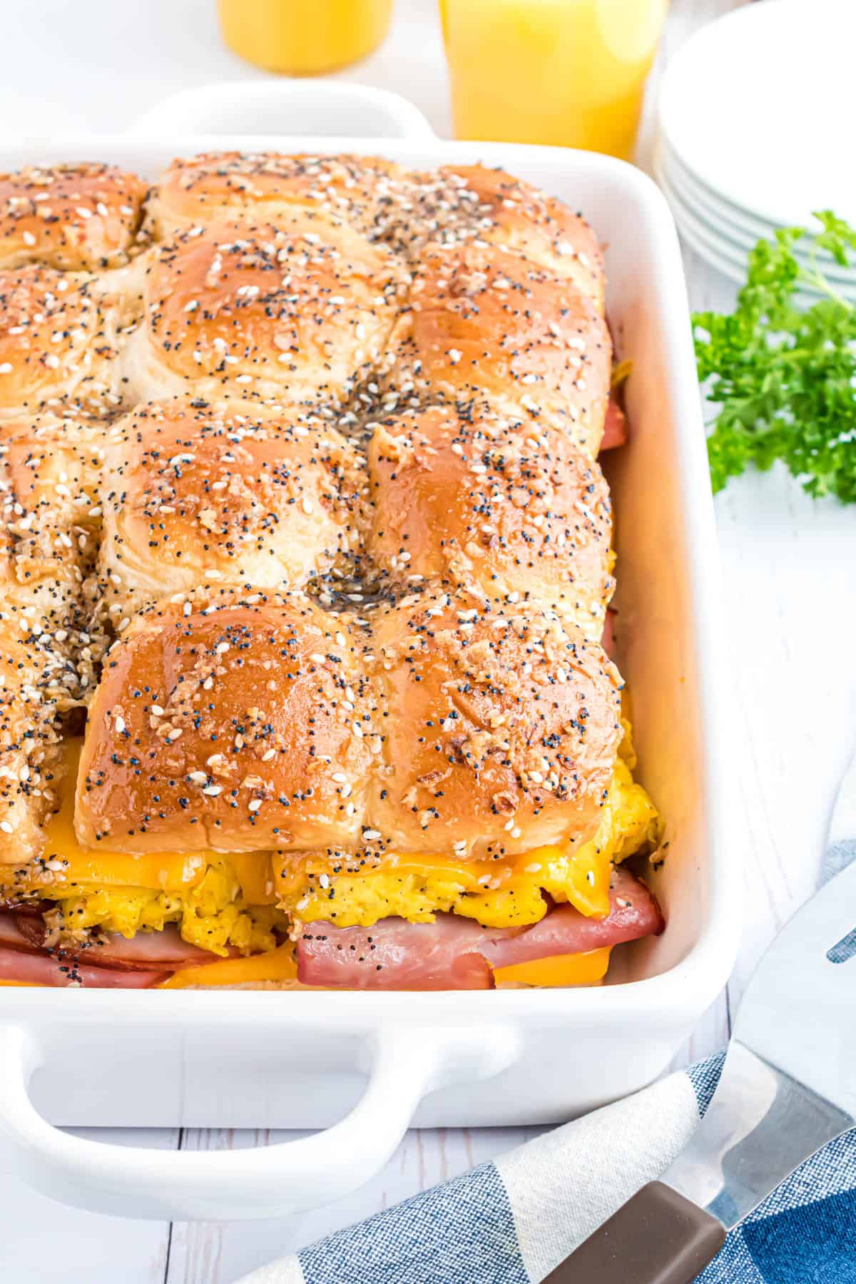 Top view of brekafast sliders in a casserole dish.