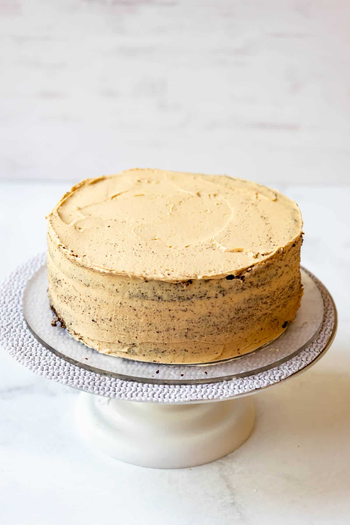 A chocolate peanut butter cake covered with peanut butter frosting.