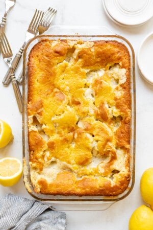 An overhead image of a lemon earthquake cake in a 9x13-inch baking dish.