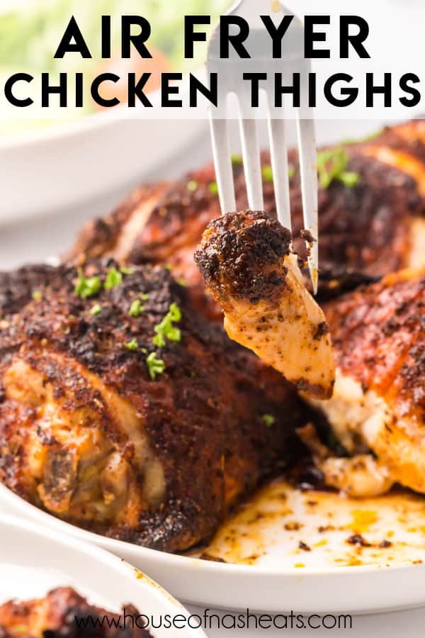A fork lifting a bite of blackened chicken made in the air fryer with text overlay.