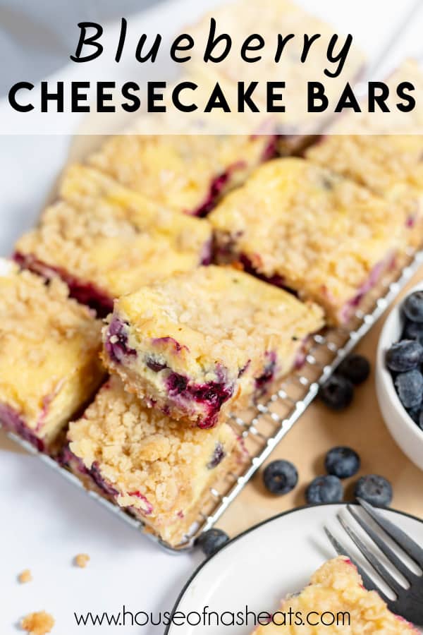Blueberry cheesecake bars on a wire rack with text overlay.