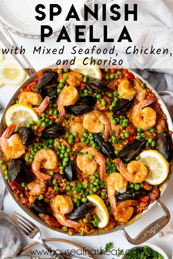 A large skillet of Spanish paella with text overlay.