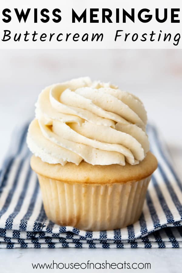 A cupcake with a tall swirl of swiss meringue buttercream frosting piped on top with text overlay.