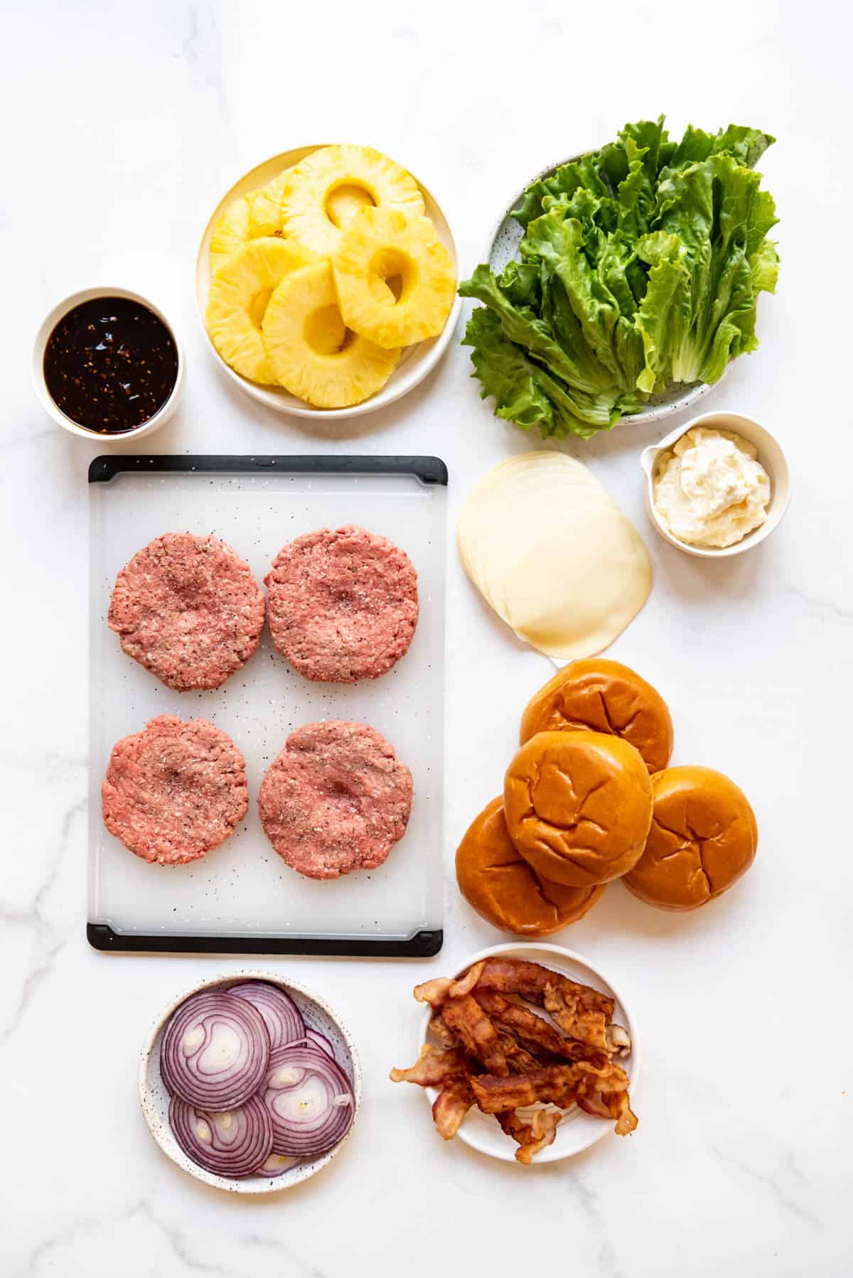 Ingredients for making Hawaiian burgers.