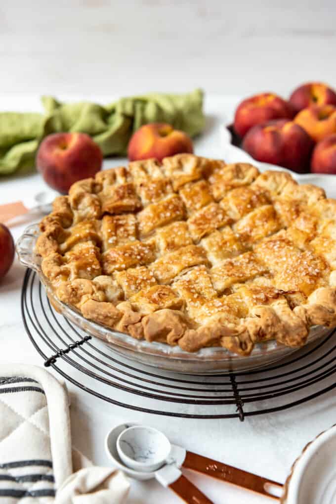 A fully baked lattice peach pie.