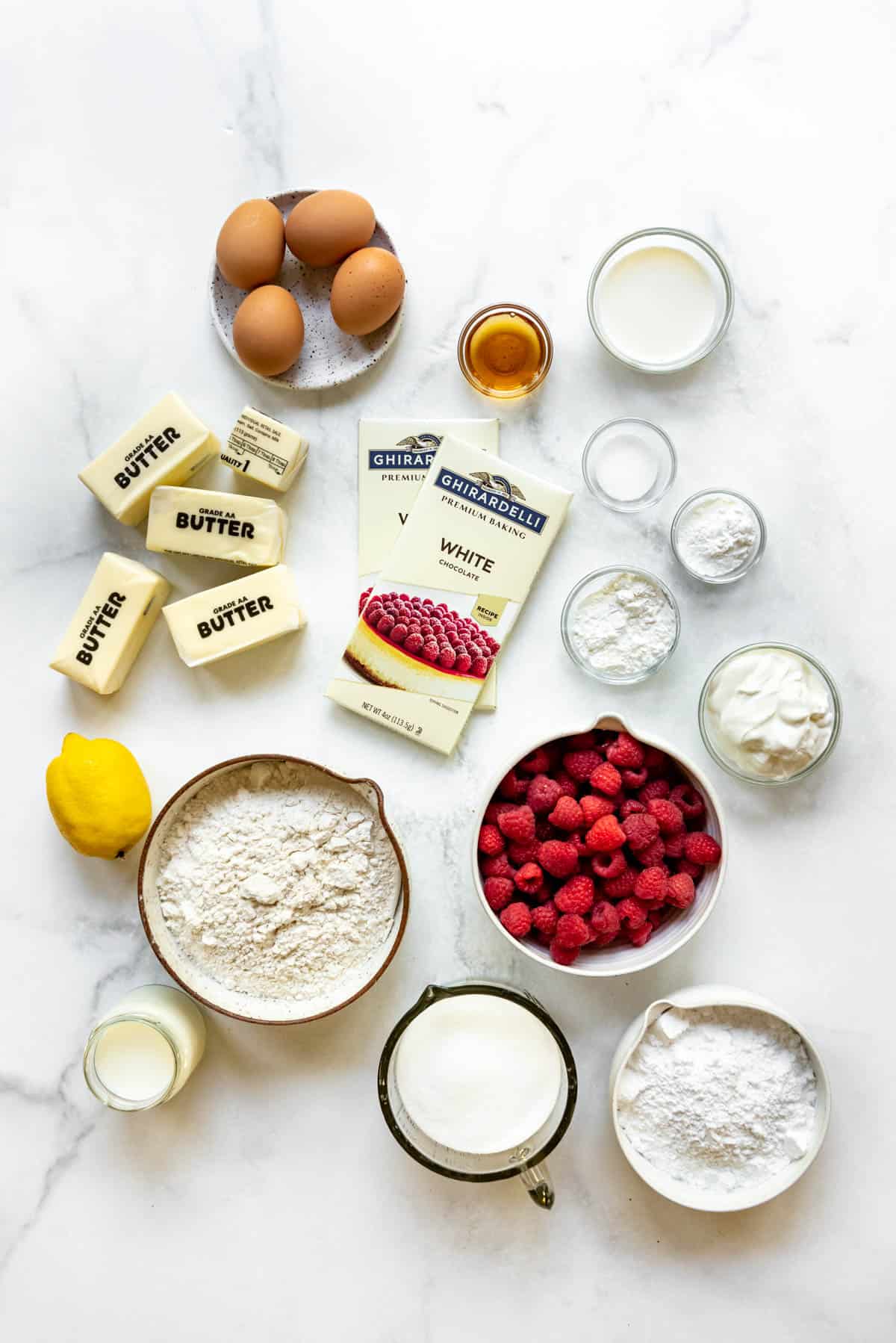 Ingredients for making a white chocolate raspberry cake.