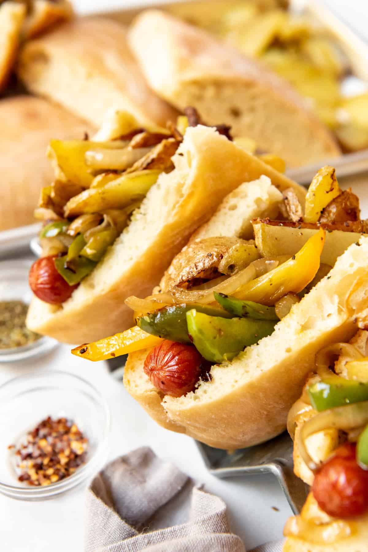New Jersey Italian hot dogs in pizza bread with onions, peppers, and potatoes.