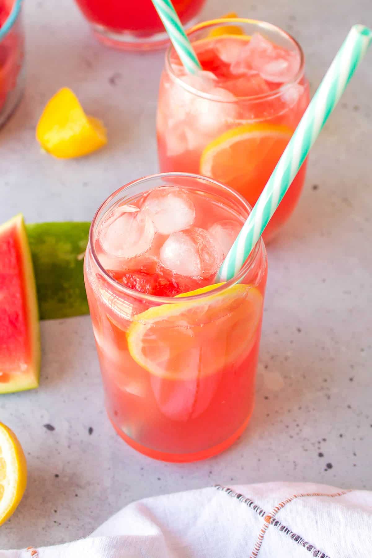 Two glasses of watermelon lemonade.