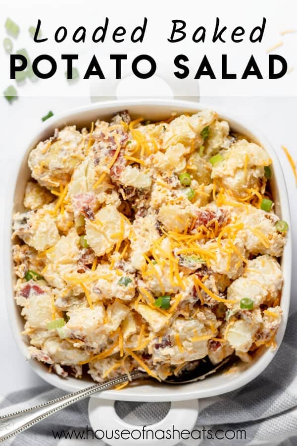 A large serving bowl of loaded baked potato salad with bacon and cheese with text overlay.