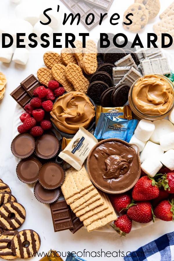 A gourment s'mores dessert board with text overlay.