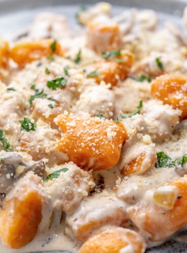 Homemade sweet potato gnocchi with a creamy mushroom sauce.