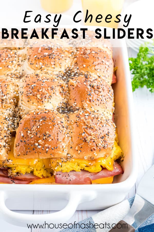 Breakfast sliders in a white baking dish with text overlay.
