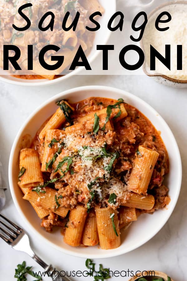 A bowl of sausage rigatoni pasta with text overlay.