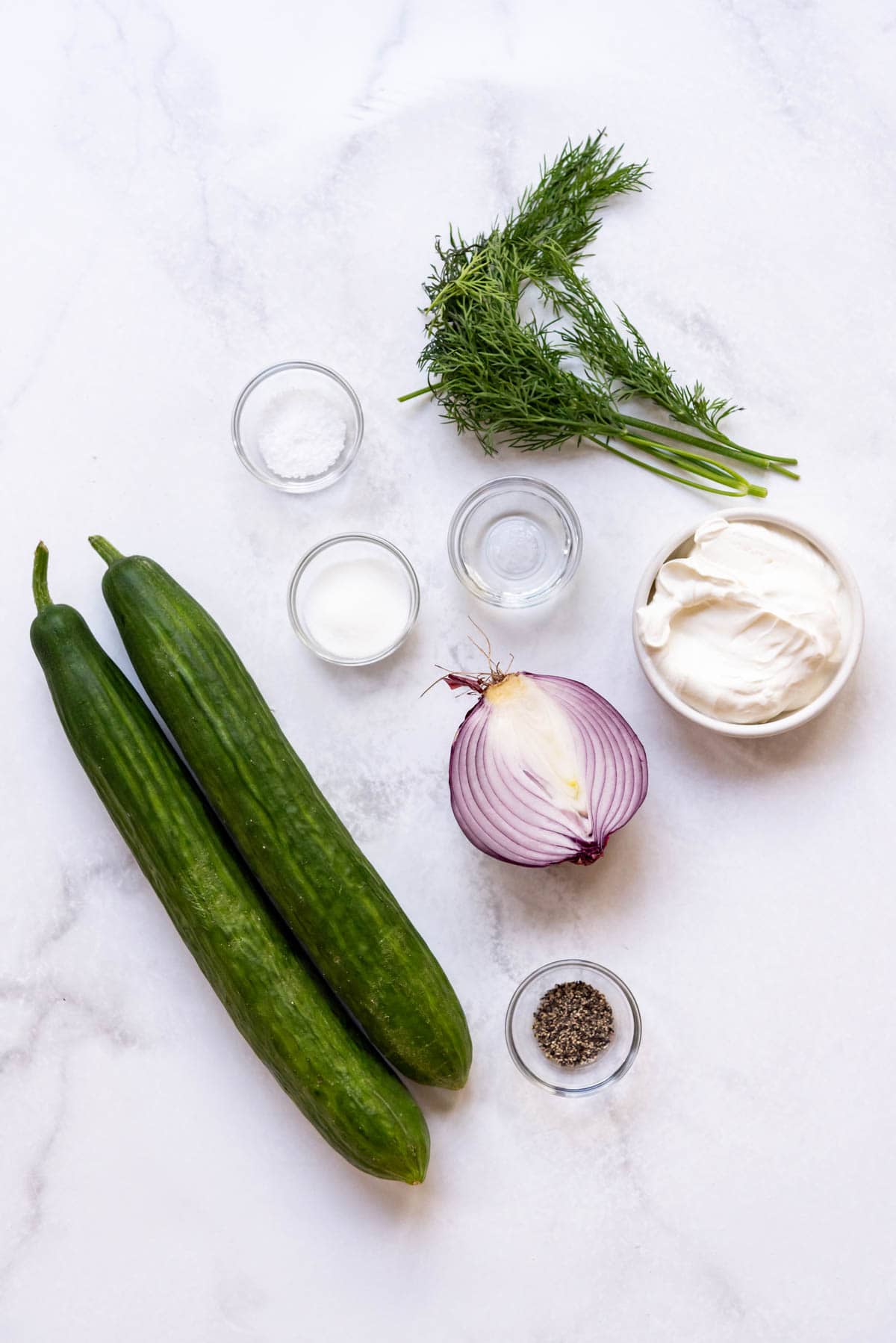 Ingredients for creamy German cucumber salad.