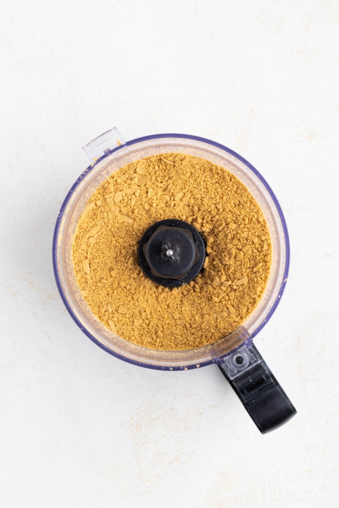 Finely crushed gingersnap cookies in a food processor.