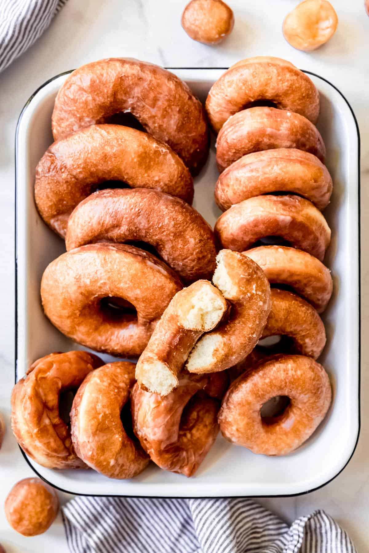 Glazed donuts in a pan.