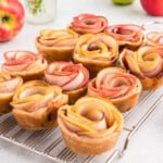 A close image of puff pastry apple roses.