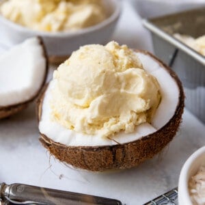 Homemade coconut ice cream in half a coconut as a bowl.