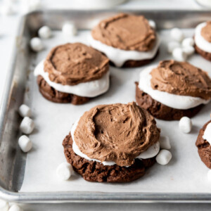 Copycat Cutler's Frosted Chocolate Marshmallow Cookies on a baking sheet lined with parchment paper.