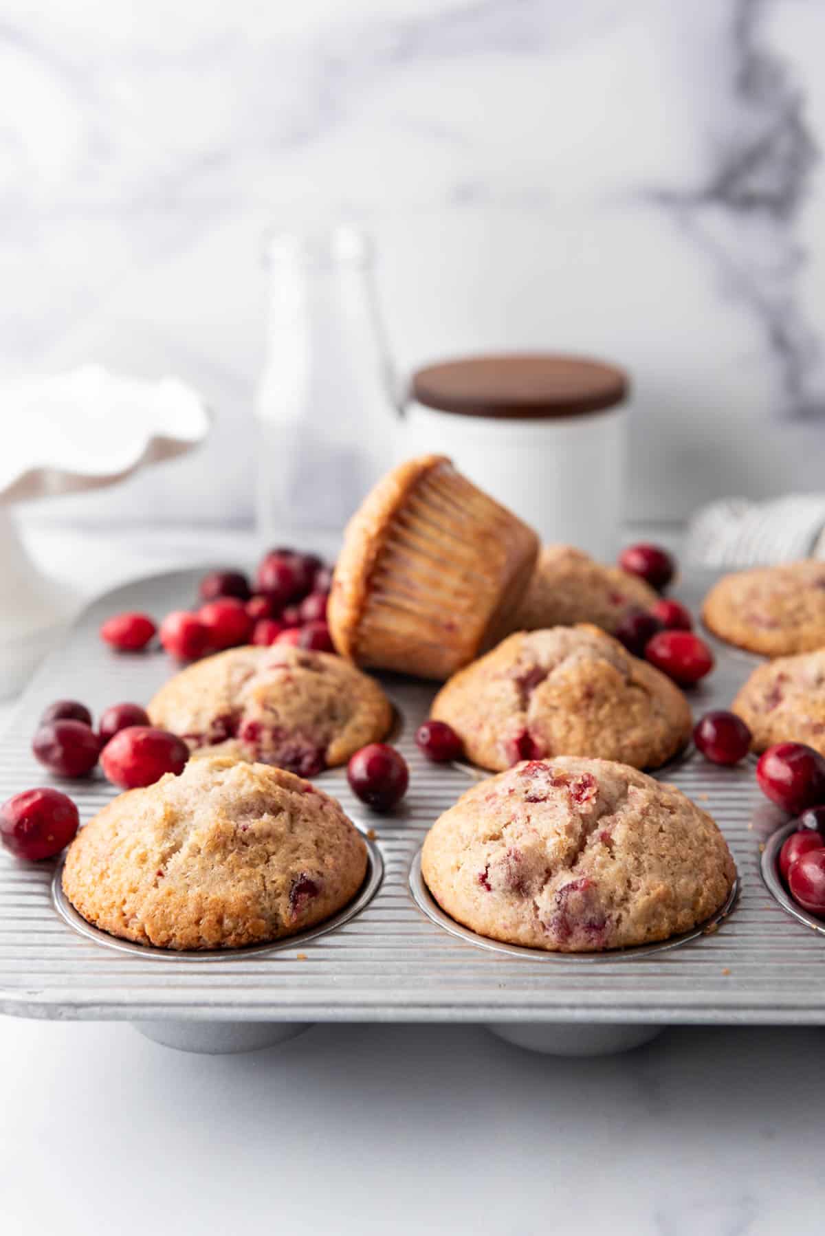 Leftover cranberry sauce muffins in a baking pan.