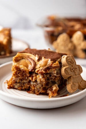 A slice of gingerbread earthquake cake on a plate.