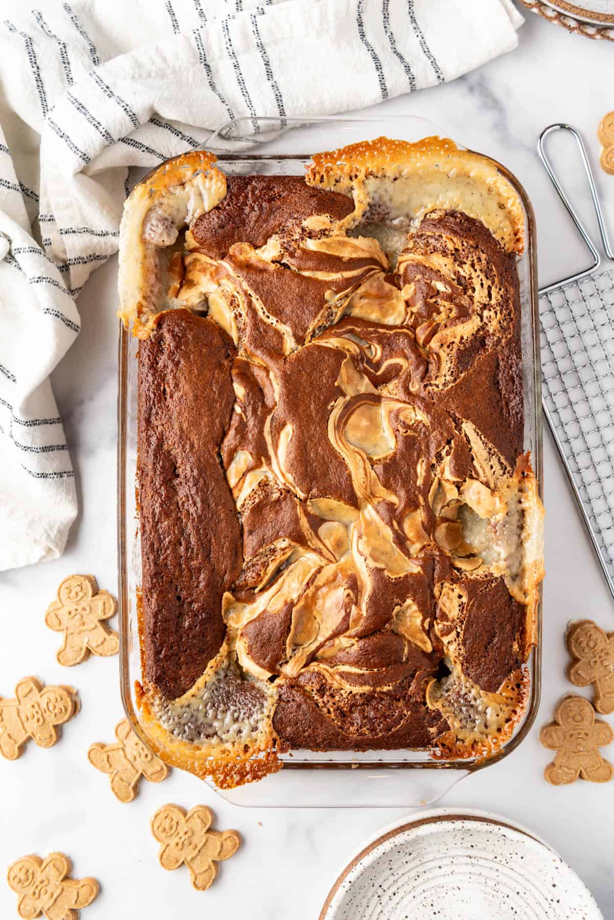Baked gingerbread earthquake cake in a glass baking dish.