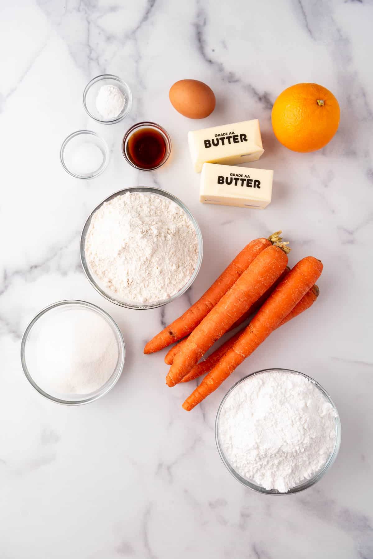Ingredients for carrot cookies with orange glaze.