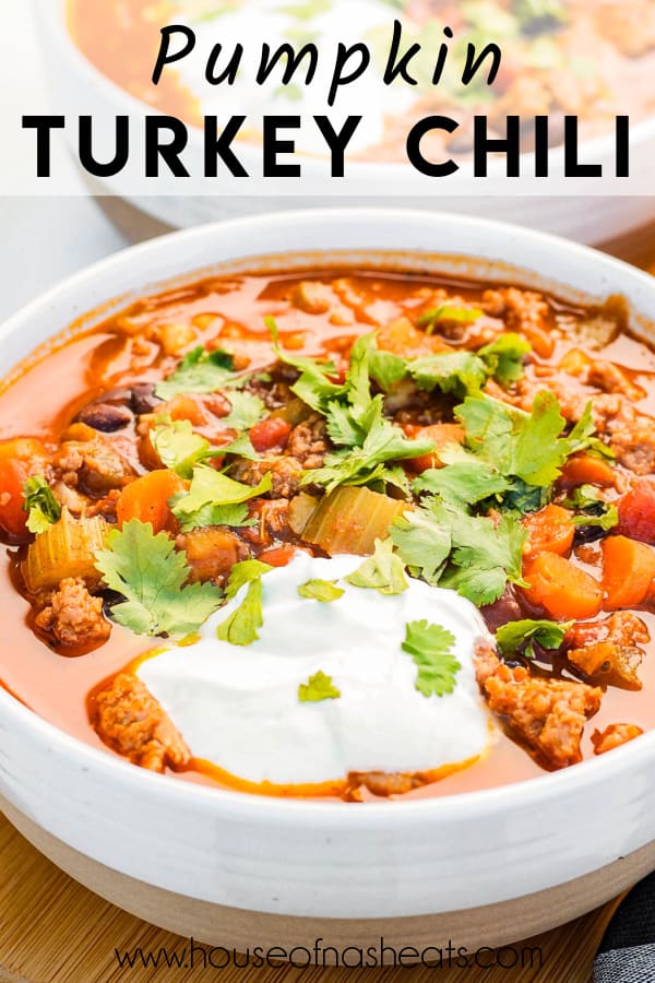 A large bowl of pumpkin turkey chili with text overlay.