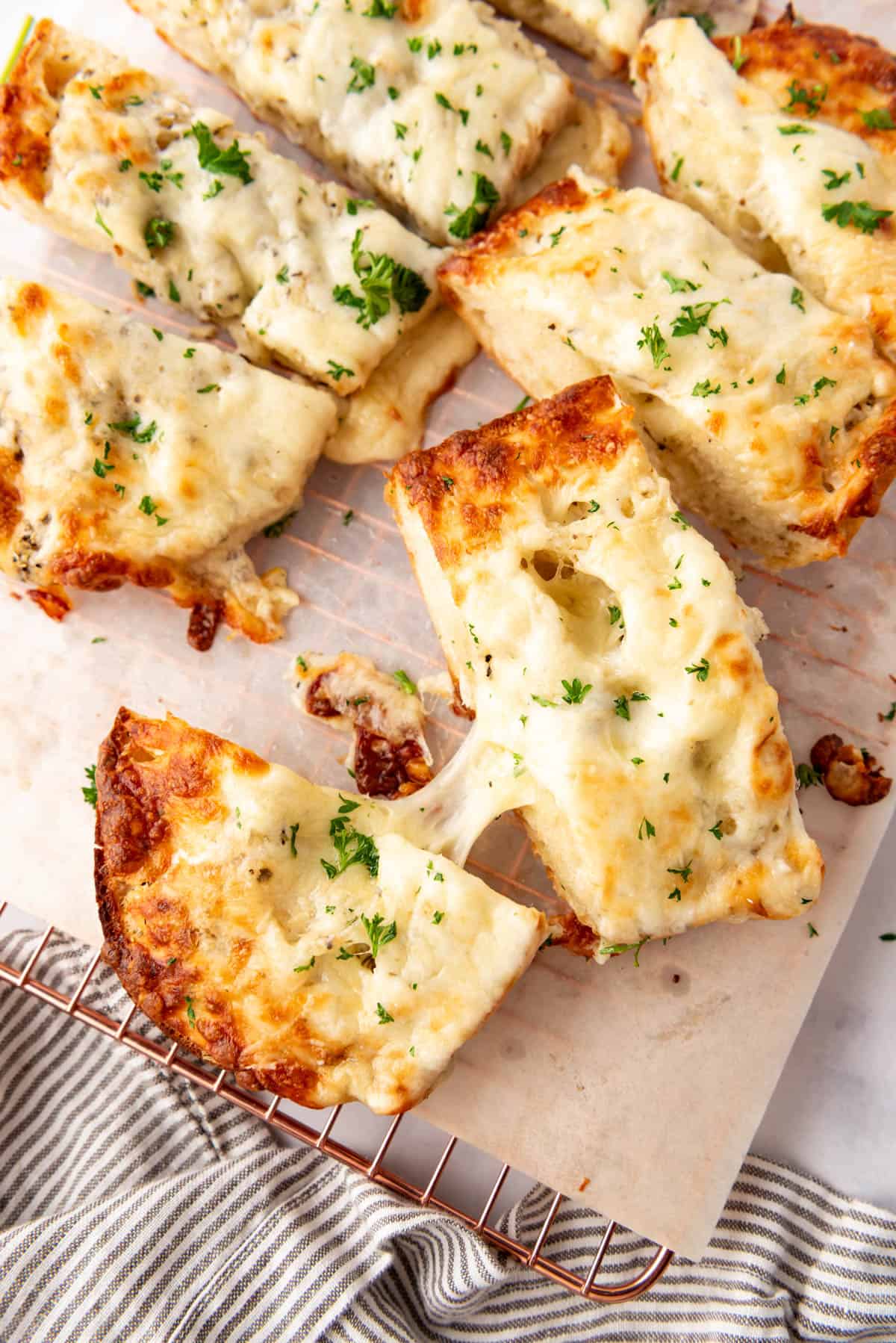 Garlic bread with mozzarella cheese.