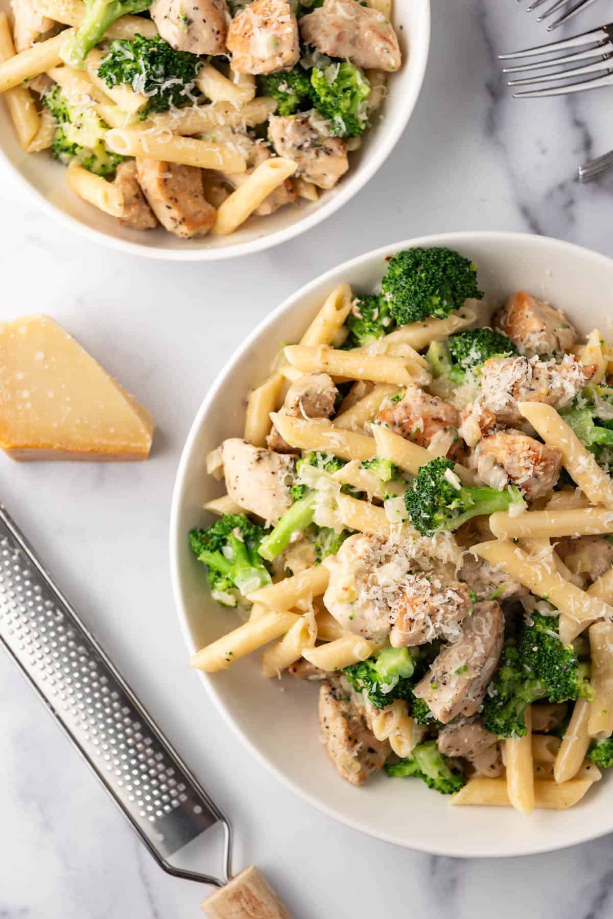 Bowls of easy chicken broccoli pasta.