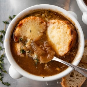 An overhead image of a bowl of french onion soup.