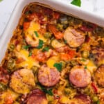 A square image of sausage and rice casserole.