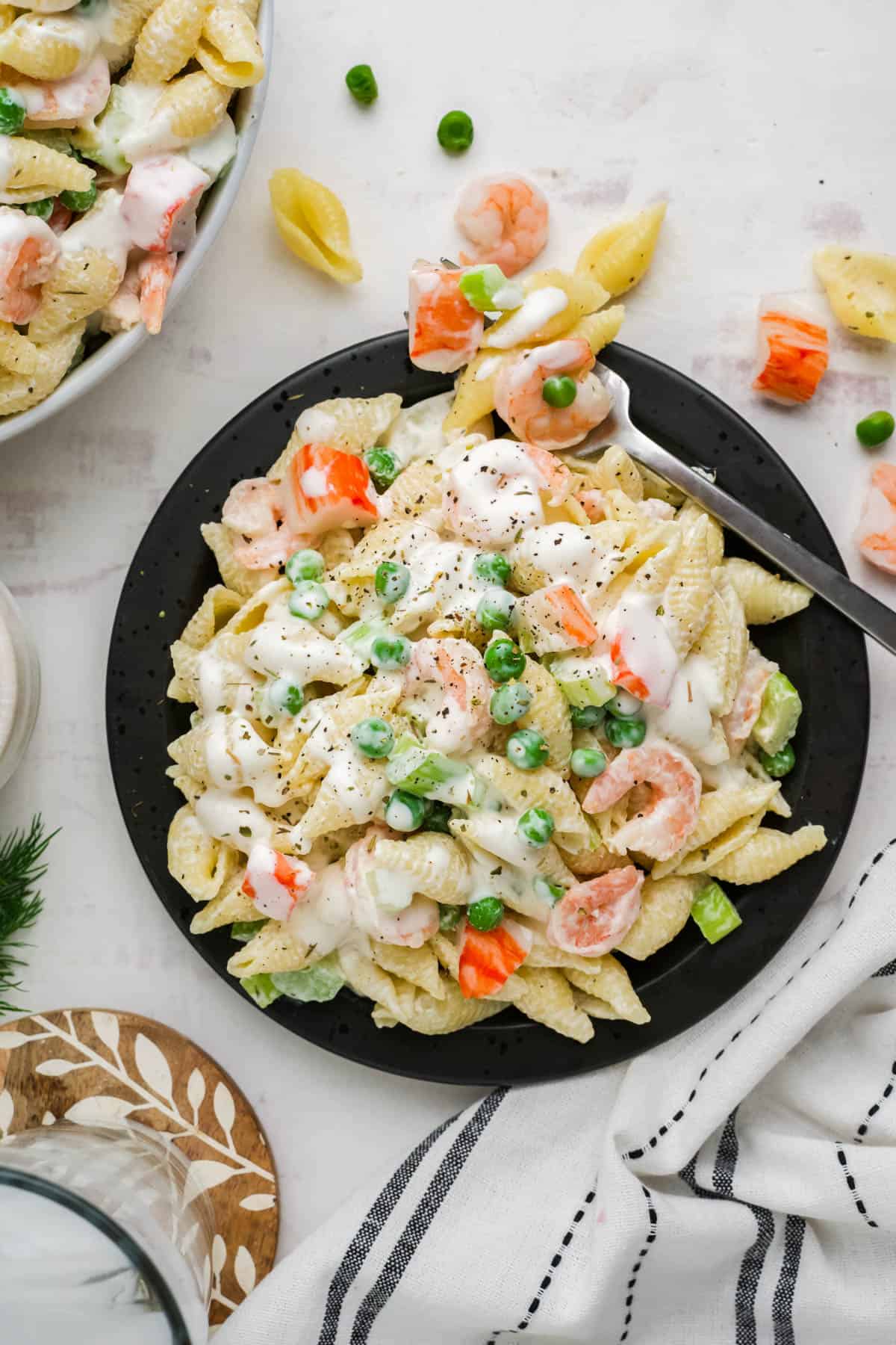 A plate of seafood pasta salad.