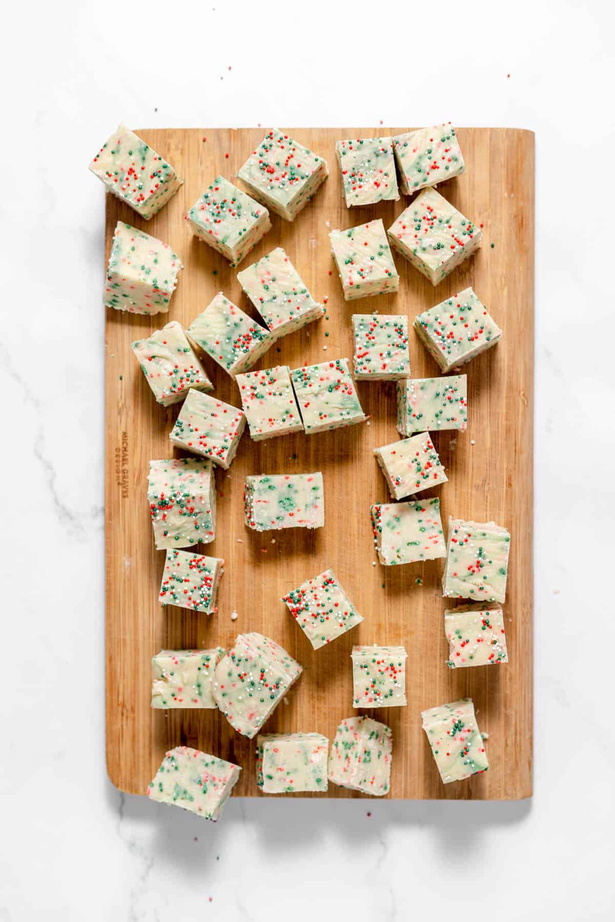 Sugar cookie fudge sliced into small squares.