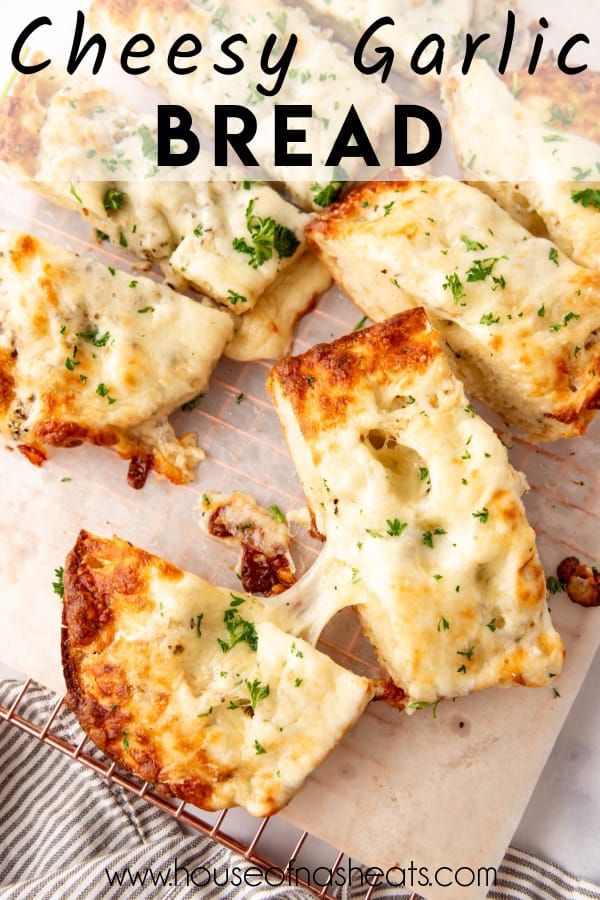 An overhead image of slices of cheesy garlic bread with text overlay.