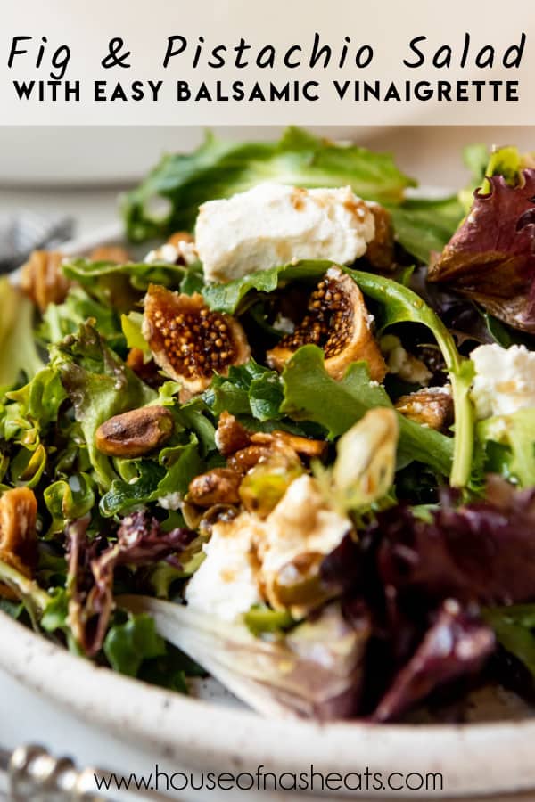 Figs, goat cheese, and pistachios on salad with text overlay.