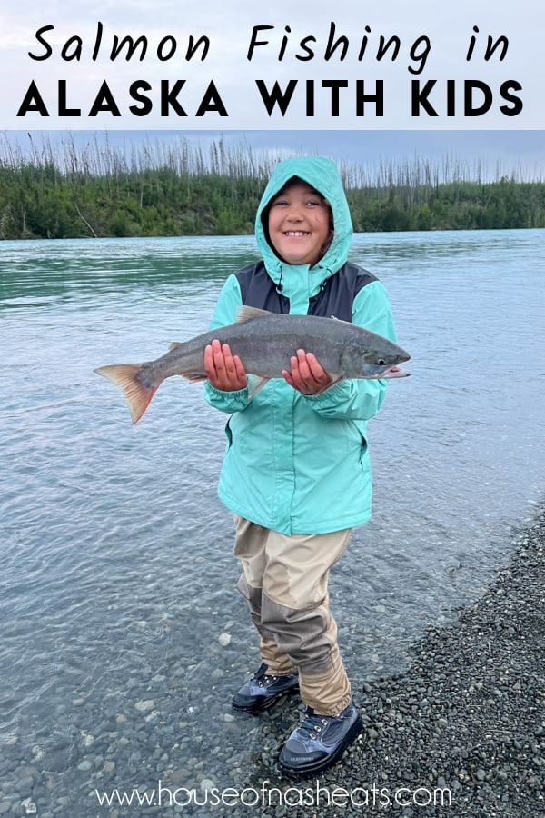 A girl holding a sockeye salmon in Alaska with text overlay.