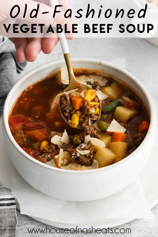 A bowl of vegetable beef soup with text overlay.