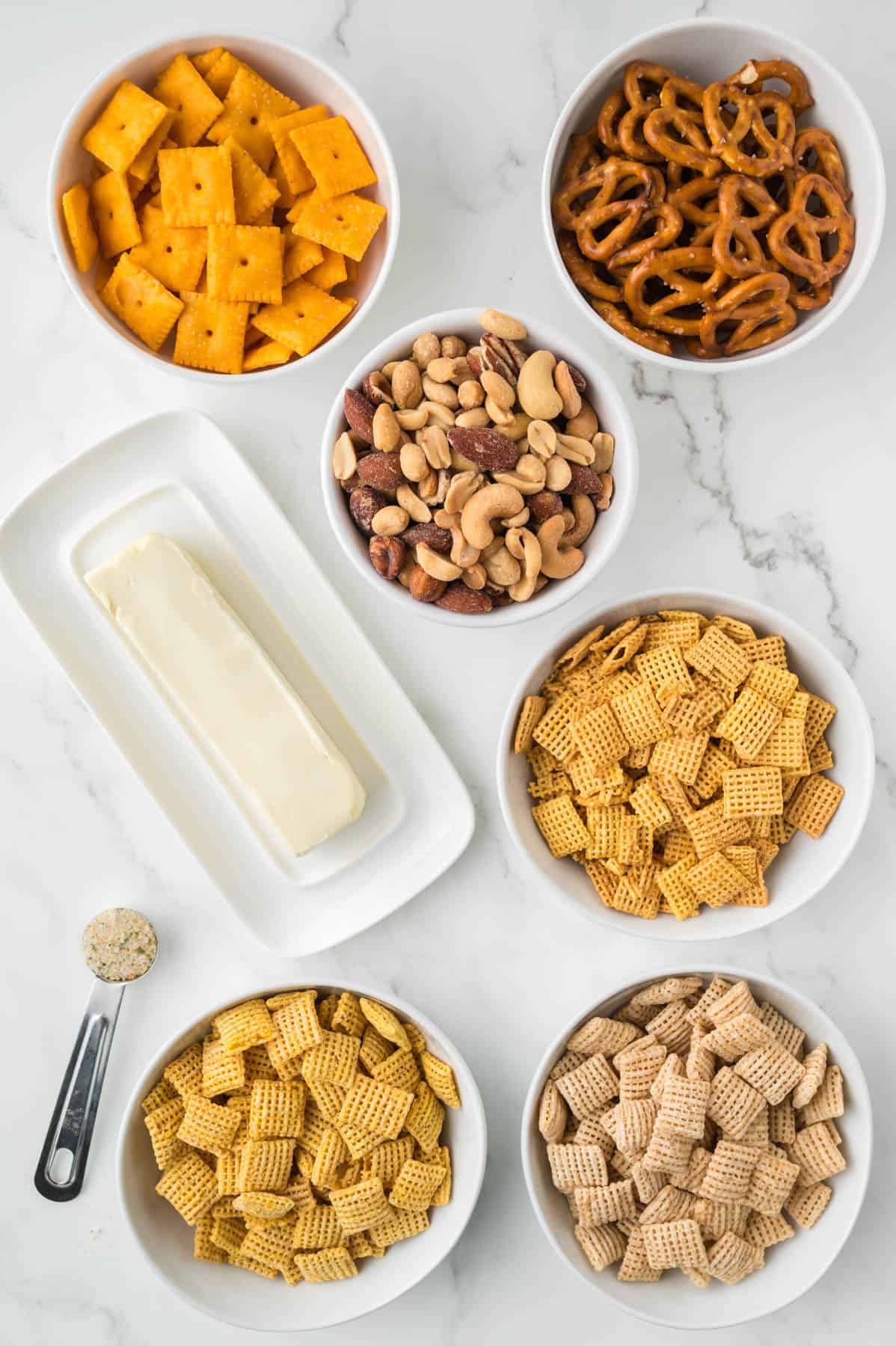 Ingredients for a homemade chex mix recipe.