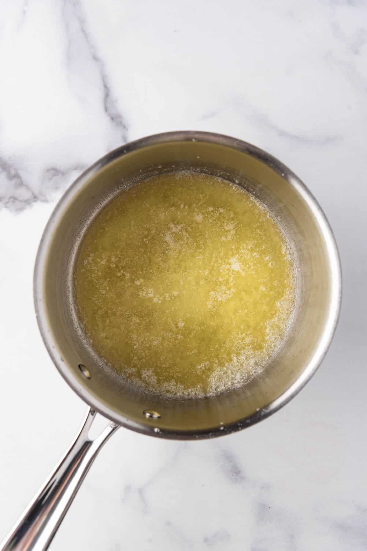 Melted butter in a medium saucepan.
