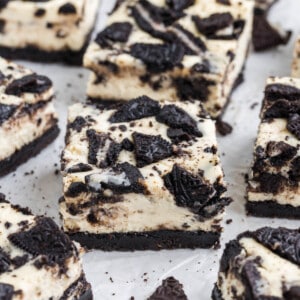 Oreo cheesecake bars cut into squares.