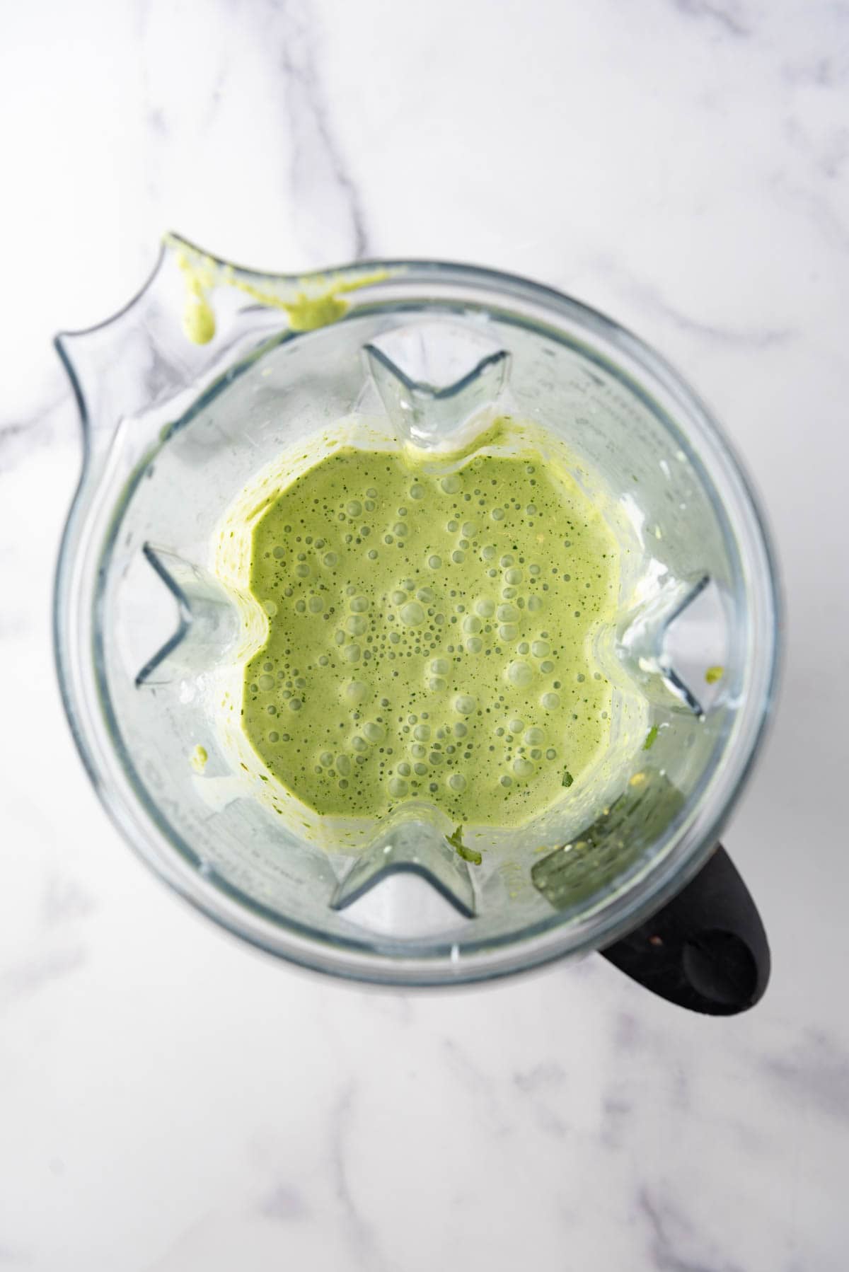 Blended creamy poblano sauce in a blender.