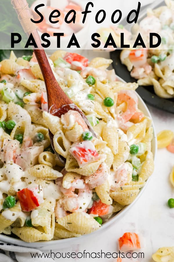 A bowl of seafood pasta salad with text overlay.