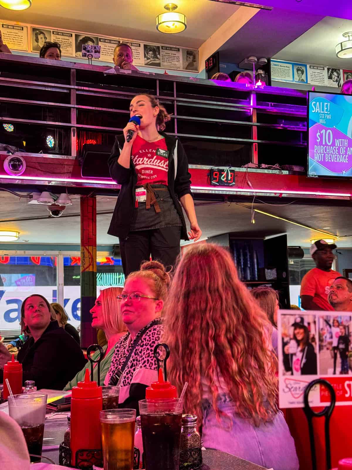 A performing server at the Stardust Diner.