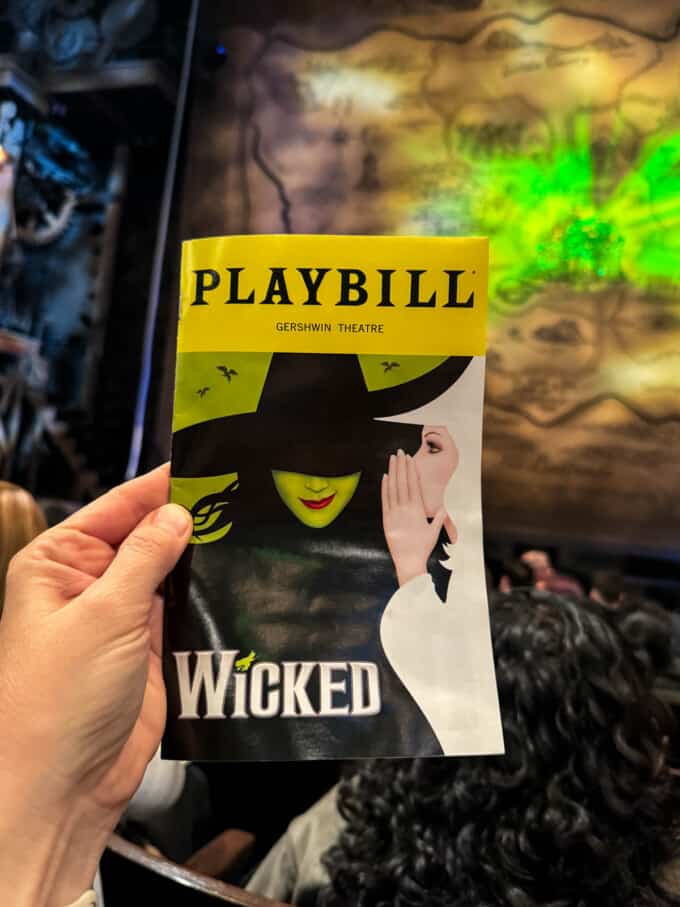 A playbill for the musical Wicked on Broadway.